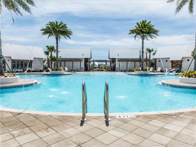 138 East E Pine, Unit A Inlet Beach, FL 32461 - Photo 34 of 48 a view of a swimming pool and a yard