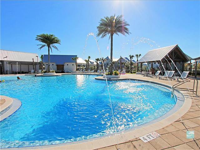 138 East E Pine, Unit A Inlet Beach, FL 32461 - Photo 35 of 48 a view of a swimming pool with a lounge chair