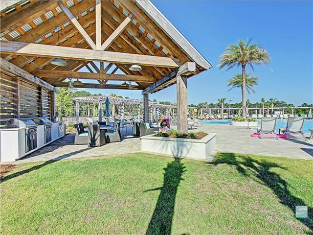138 East E Pine, Unit A Inlet Beach, FL 32461 - Photo 39 of 48 a view of a swimming pool with a patio