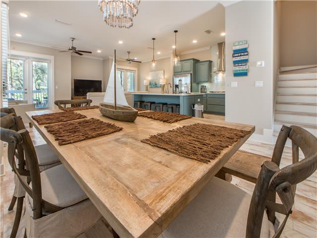 138 East E Pine, Unit A Inlet Beach, FL 32461 - Photo 3 of 48 a large kitchen with a table and chairs