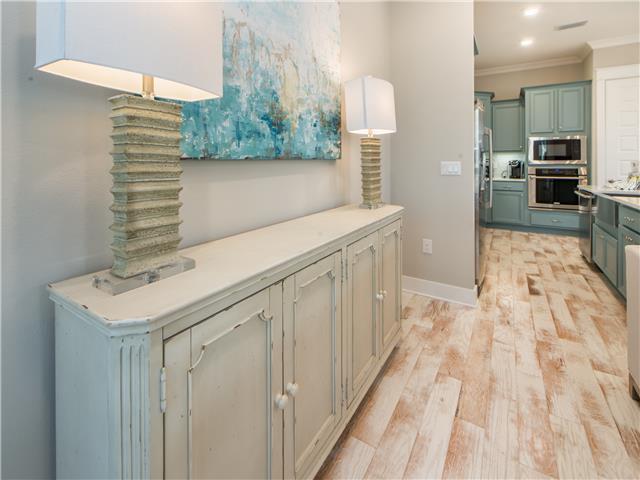 138 East E Pine, Unit A Inlet Beach, FL 32461 - Photo 5 of 48 a kitchen with a sink and a refrigerator