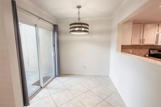 a view of a kitchen with a sink