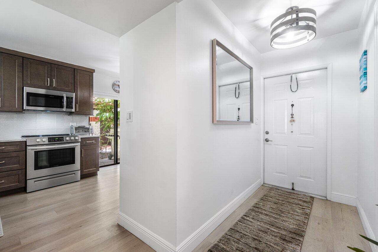 a kitchen with a stove and a microwave