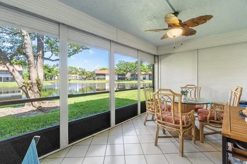 a table and chairs in a balcony