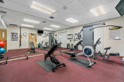 a view of a room with gym equipment