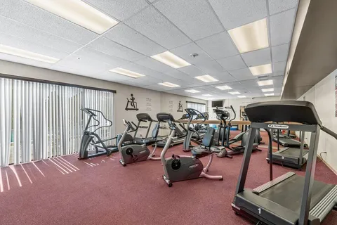 a view of a room with gym equipment