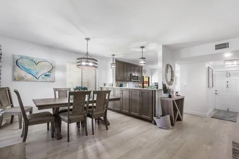 a view of a dining room with furniture