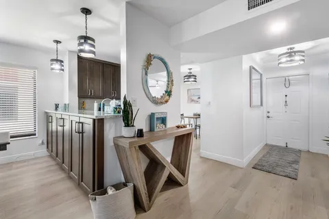 a very nice looking room with wooden floor