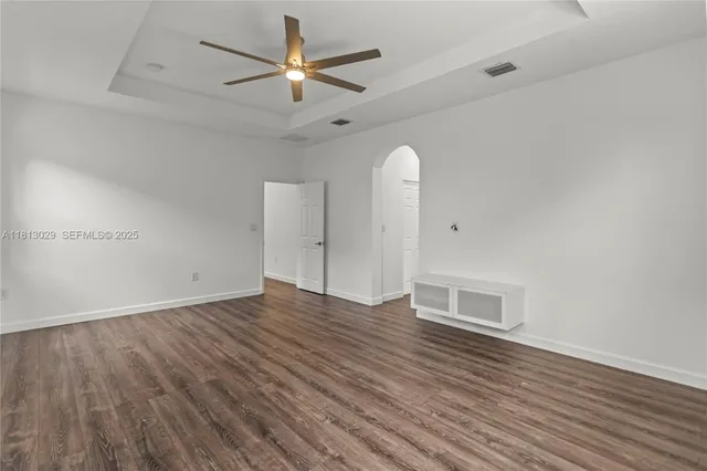 an aerial view of residential building with lake view