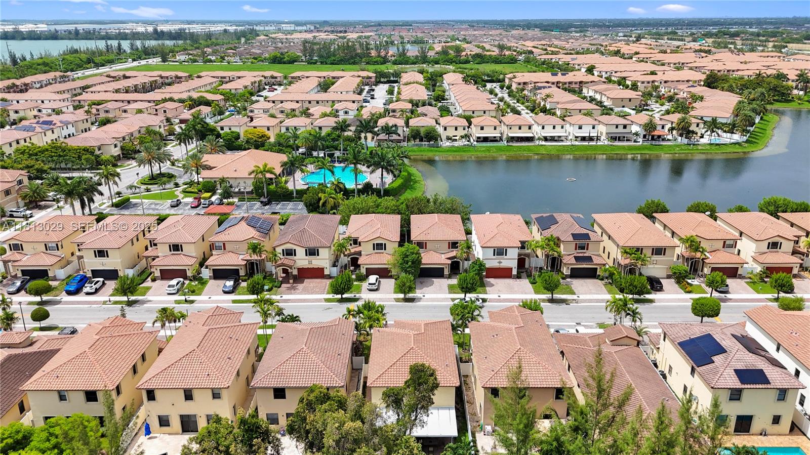 3502 West 86th Terrace Hialeah, FL 33018 - Photo 68 of 68 an aerial view of residential building with lake view