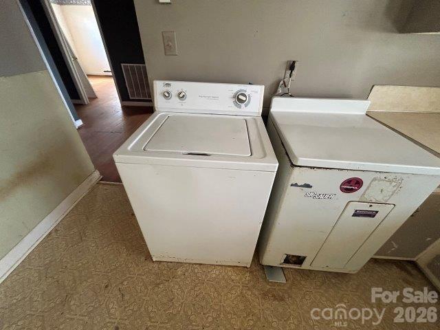 918 Emmanuel Church Road Conover, NC 28613 - Photo 11 of 17 a utility room with dryer and washer