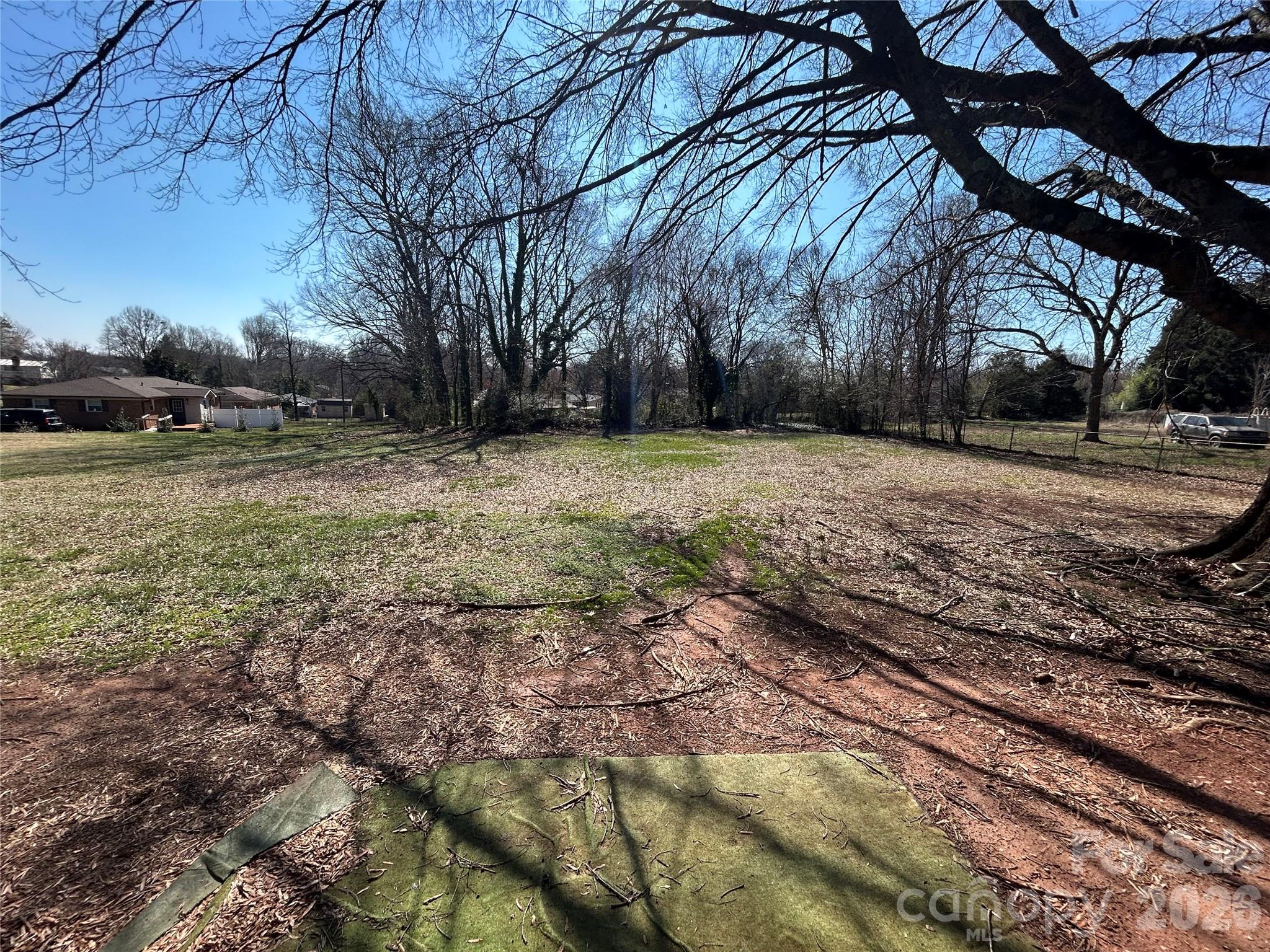 918 Emmanuel Church Road Conover, NC 28613 - Photo 14 of 17 a view of a yard with plants and trees
