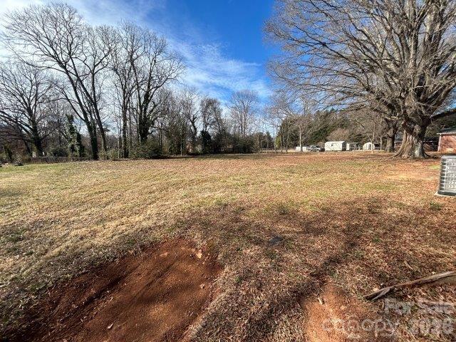 918 Emmanuel Church Road Conover, NC 28613 - Photo 15 of 17 a yard with a trees