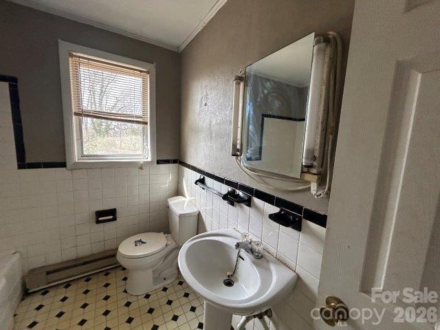 918 Emmanuel Church Road Conover, NC 28613 - Photo 3 of 17 a bathroom with a sink a toilet and mirror