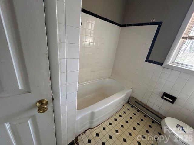 918 Emmanuel Church Road Conover, NC 28613 - Photo 4 of 17 a bathroom with a bathtub and shower