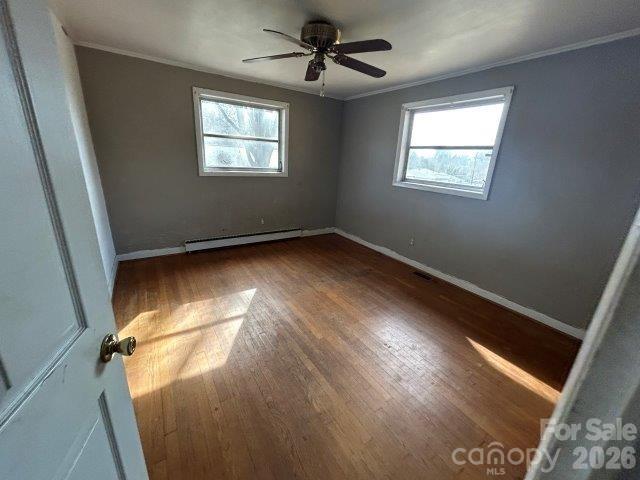 918 Emmanuel Church Road Conover, NC 28613 - Photo 5 of 17 a view of room with window and hardwood floor