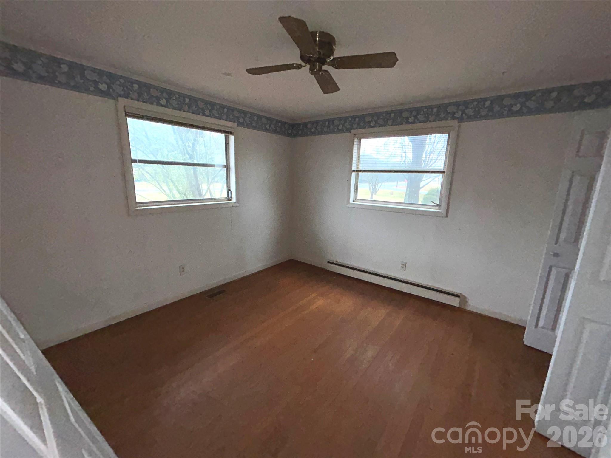 918 Emmanuel Church Road Conover, NC 28613 - Photo 6 of 17 a view of an empty room with a window
