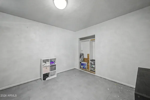 a view of a storage & utility room with toys