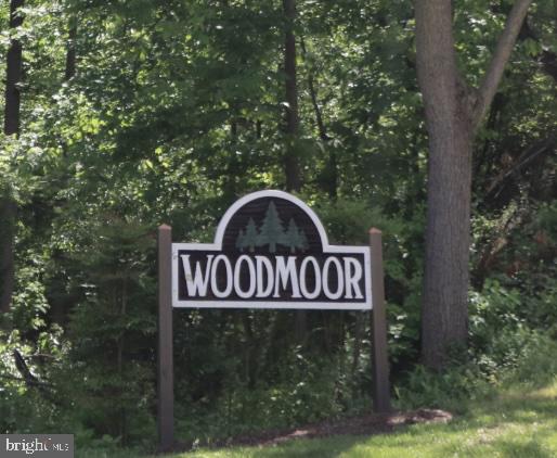 121 Whitmoor Terrace Silver Spring, MD 20901 - Photo 11 of 11 a sign that is on a pole