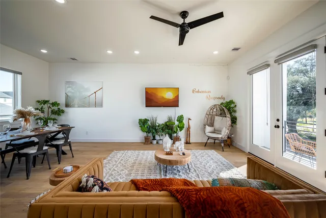 a living room with furniture and window