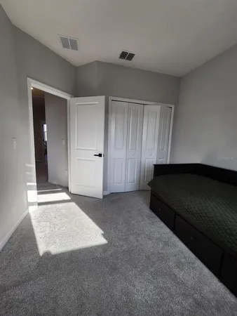 an empty room with closet