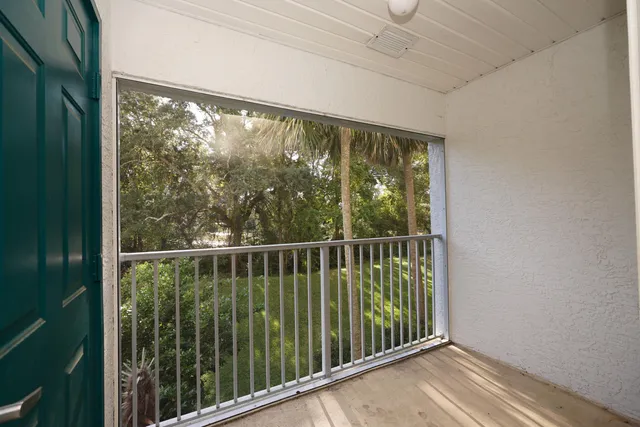 a view of backyard with green space