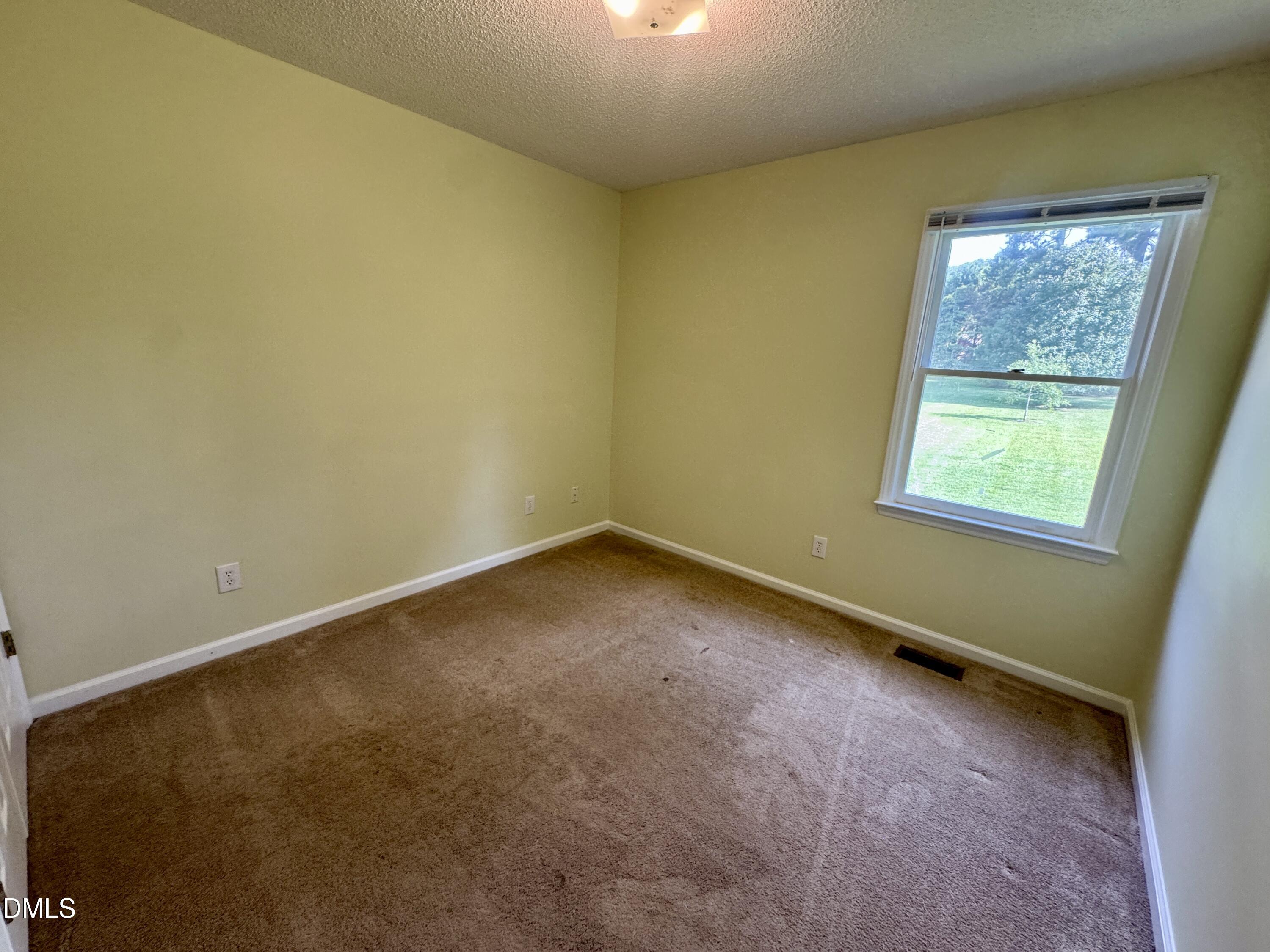 4313 Rockside Hills Drive Raleigh, NC 27603 - Photo 18 of 29 Bedroom 3