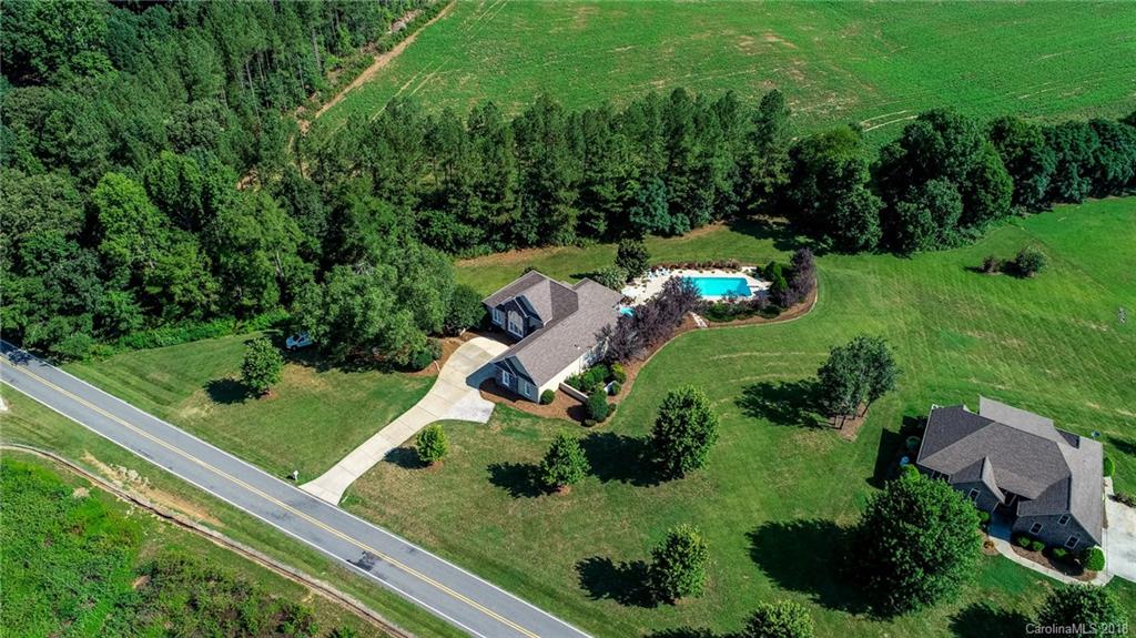 3526 Sincerity Road, Unit 13 Monroe, NC 28110 - Photo 2 of 20 an aerial view of a golf course with play ground