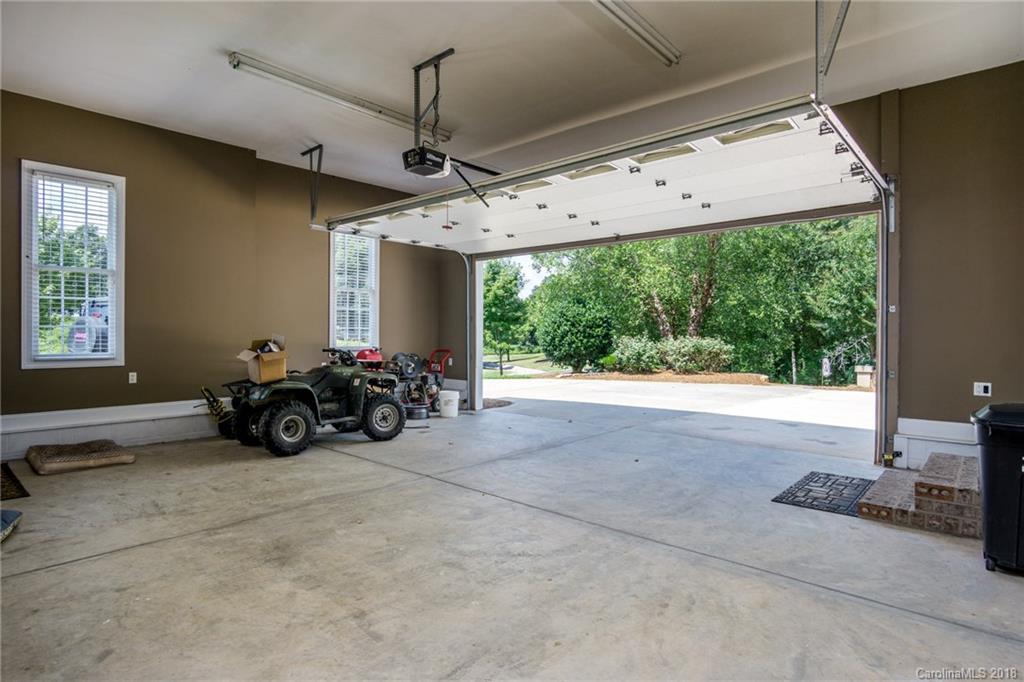 3526 Sincerity Road, Unit 13 Monroe, NC 28110 - Photo 15 of 20 a view of a livingroom with furniture and a chandelier