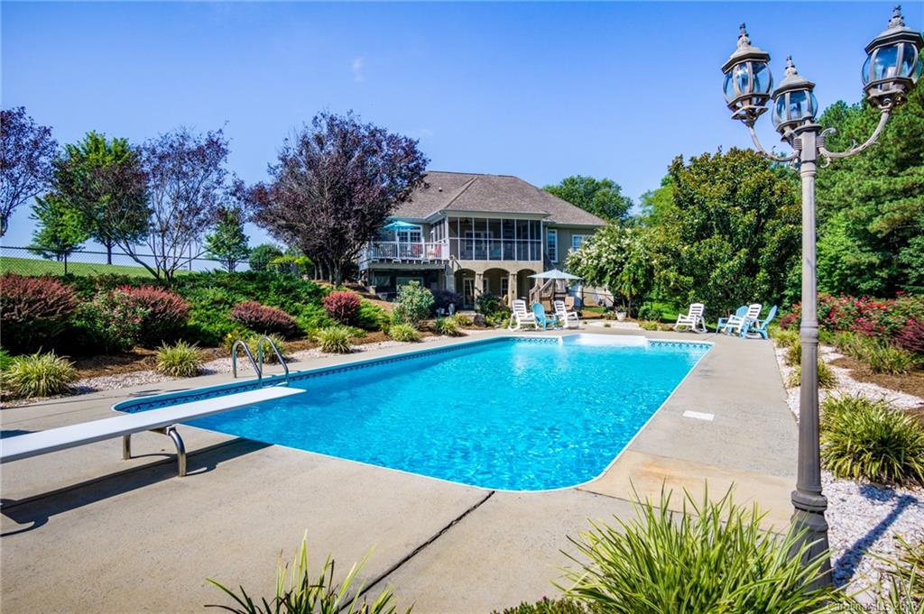 3526 Sincerity Road, Unit 13 Monroe, NC 28110 - Photo 16 of 20 a view of a swimming pool with a patio