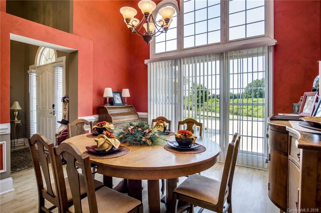 3526 Sincerity Road, Unit 13 Monroe, NC 28110 - Photo 5 of 20 a view of a dining room with furniture window and outside view