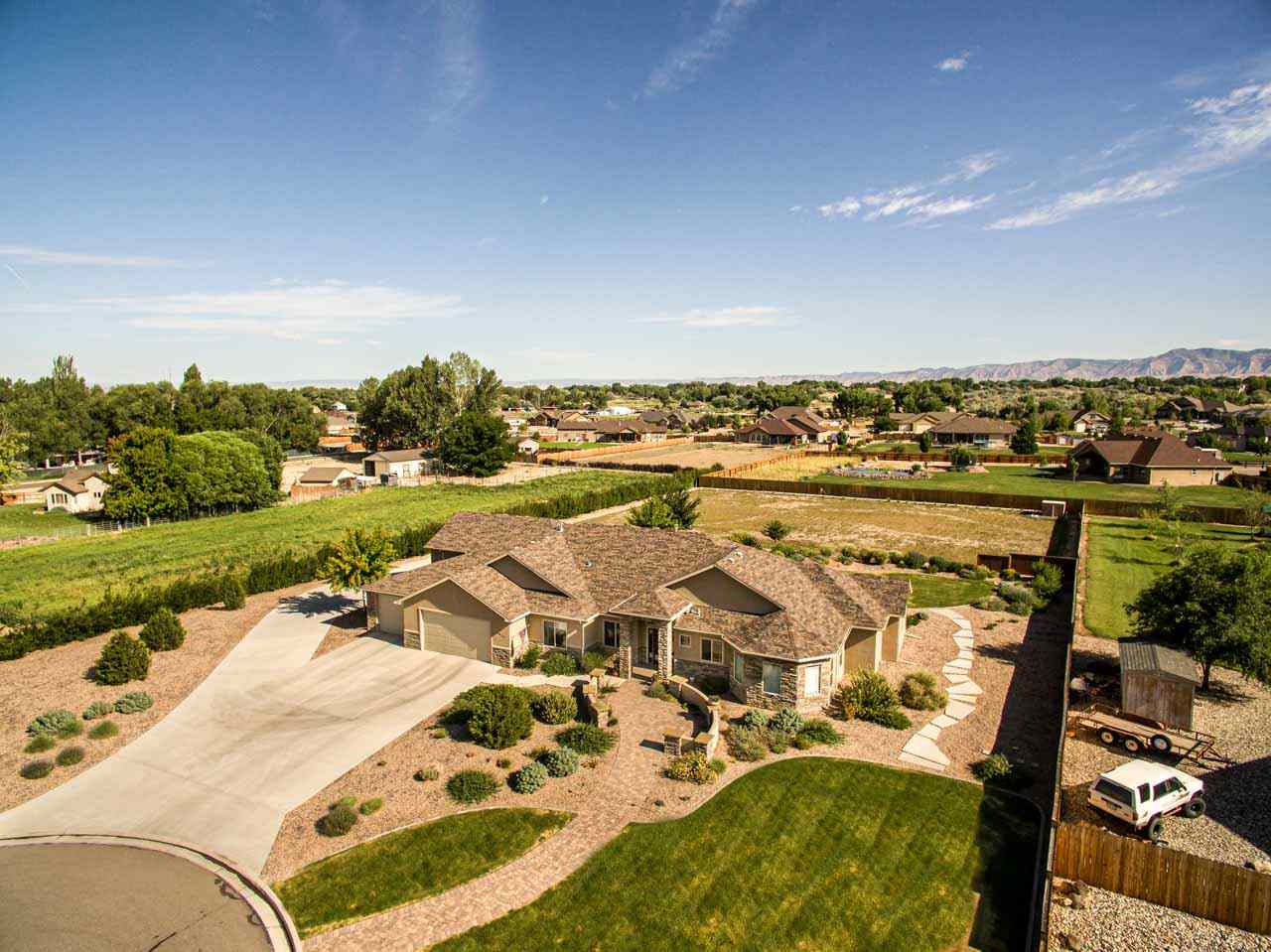 2530 Riata Ranch Court Grand Junction, CO 81505 - Photo 36 of 41 an aerial view of residential houses with outdoor space