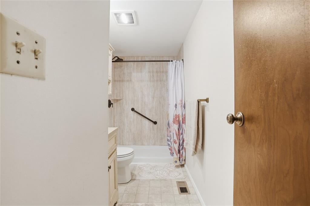 106 Squirrel Hollow Road Gibsonia, PA 15044 - Photo 20 of 46 a bathroom with a granite countertop shower and a toilet