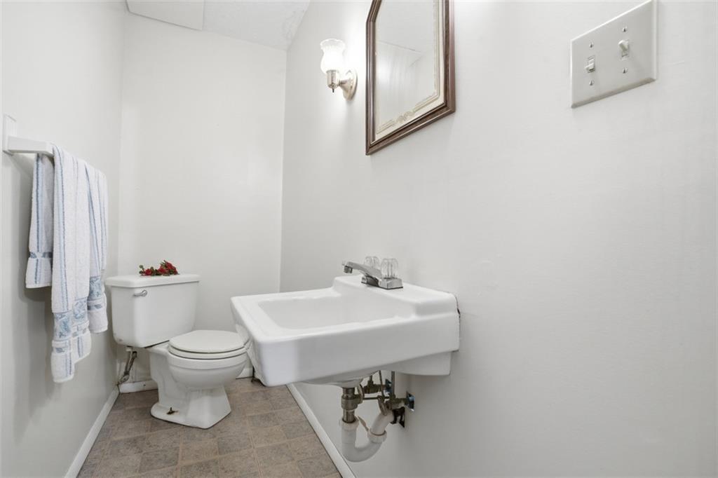 106 Squirrel Hollow Road Gibsonia, PA 15044 - Photo 34 of 46 a bathroom with a sink toilet and a mirror