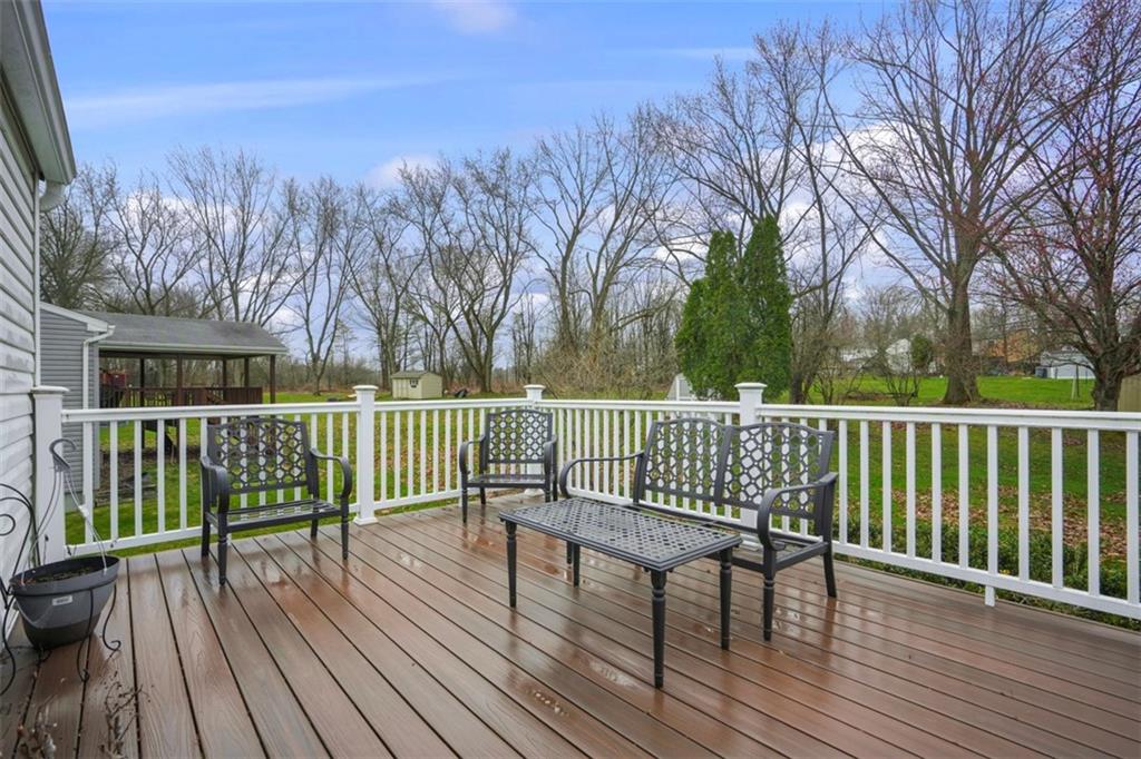 106 Squirrel Hollow Road Gibsonia, PA 15044 - Photo 36 of 46 a view of a wooden deck with trees