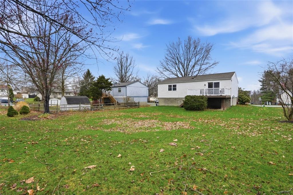 106 Squirrel Hollow Road Gibsonia, PA 15044 - Photo 41 of 46 a view of a house with a back yard