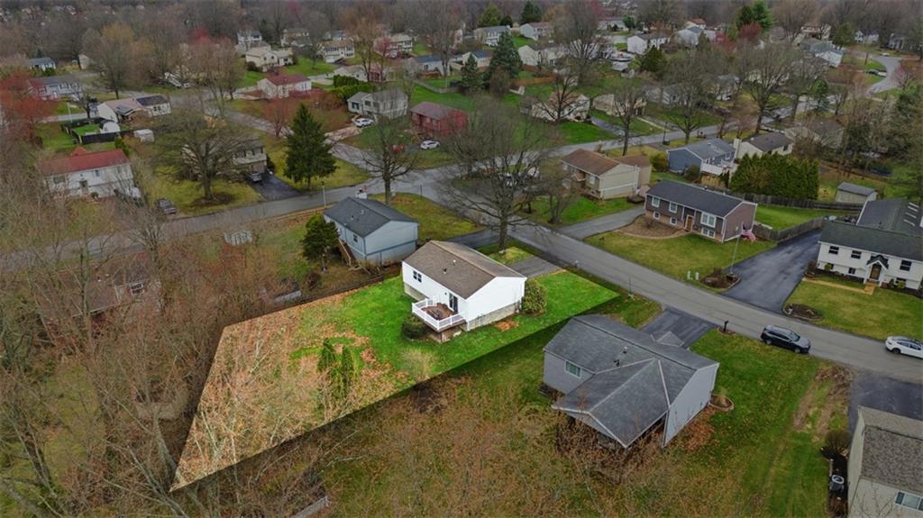 106 Squirrel Hollow Road Gibsonia, PA 15044 - Photo 42 of 46 an aerial view of a house with a yard