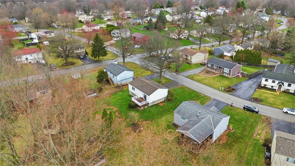 106 Squirrel Hollow Road Gibsonia, PA 15044 - Photo 43 of 46 an aerial view of a house with a lake view
