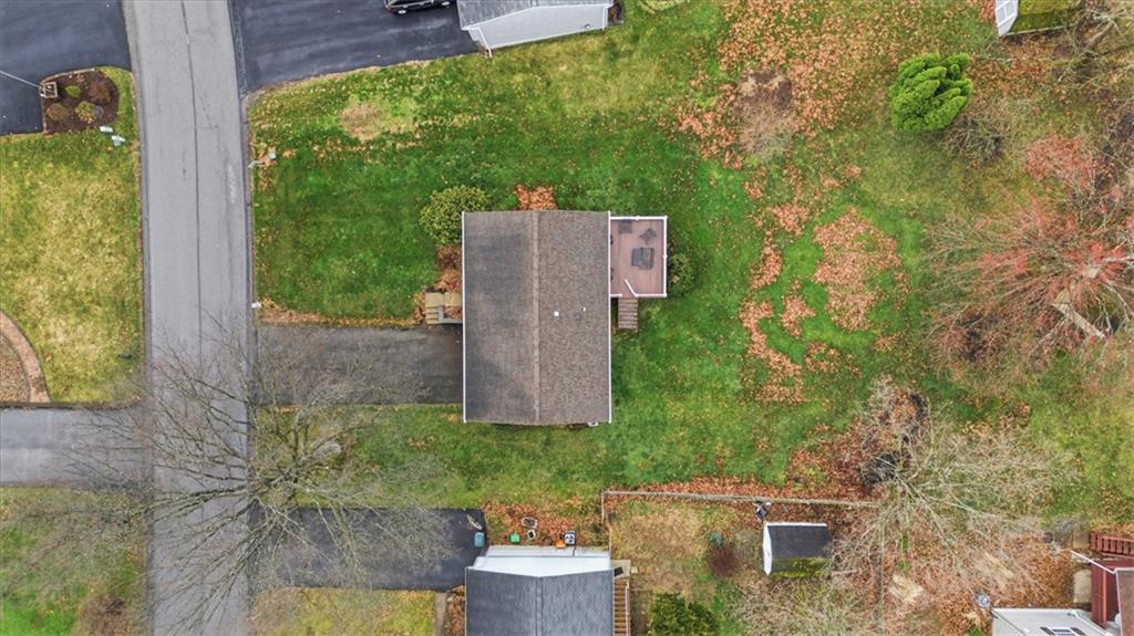 106 Squirrel Hollow Road Gibsonia, PA 15044 - Photo 5 of 46 an aerial view of a house with a yard