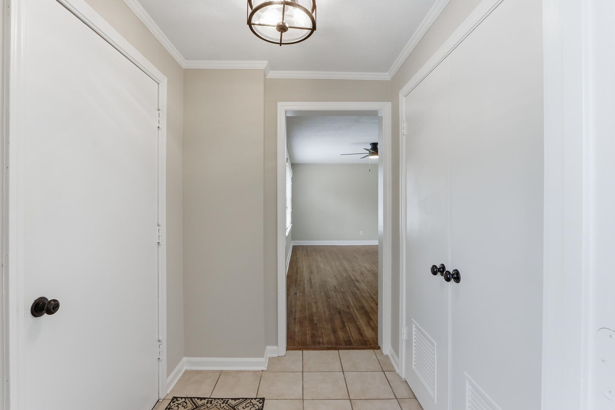 312 Fernway Road Memphis, TN 38117 - Photo 3 of 38 Hall with ornamental molding and light tile patterned floors