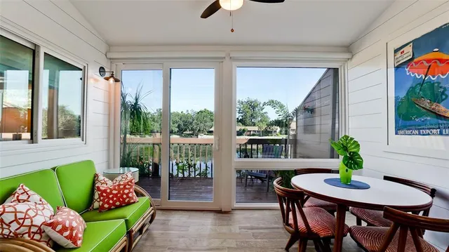 a outdoor living space with furniture and a potted plant