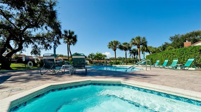 a view of a yard with a patio