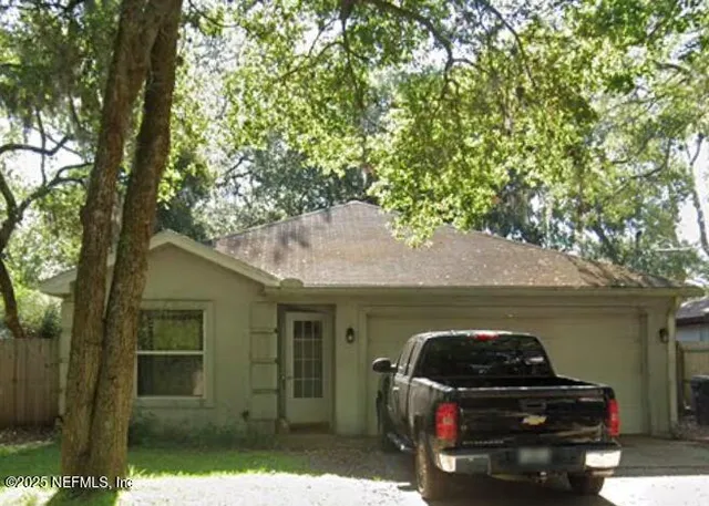 a car parked in front of a house