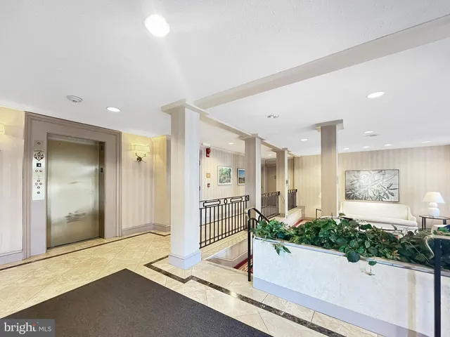 a view of a living room and bathroom