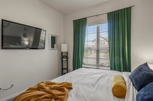 a room with furniture and a window