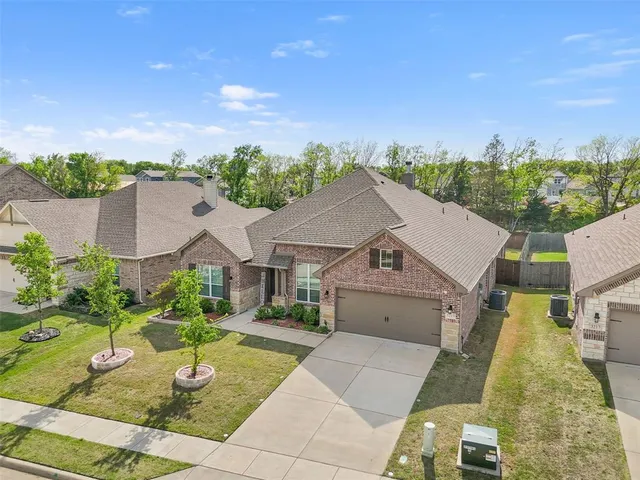 aerial view of a house with garden