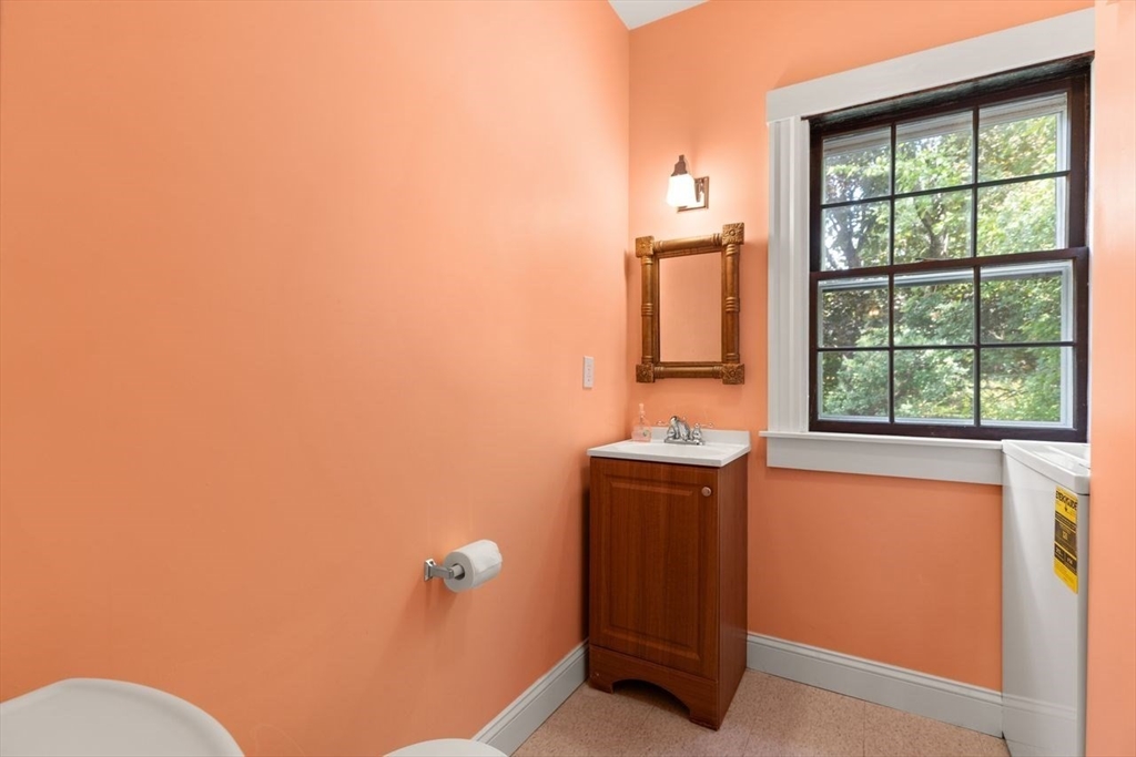 17 Pine Road Sharon, MA 02067 - Photo 18 of 33 a bathroom with a sink and a mirror