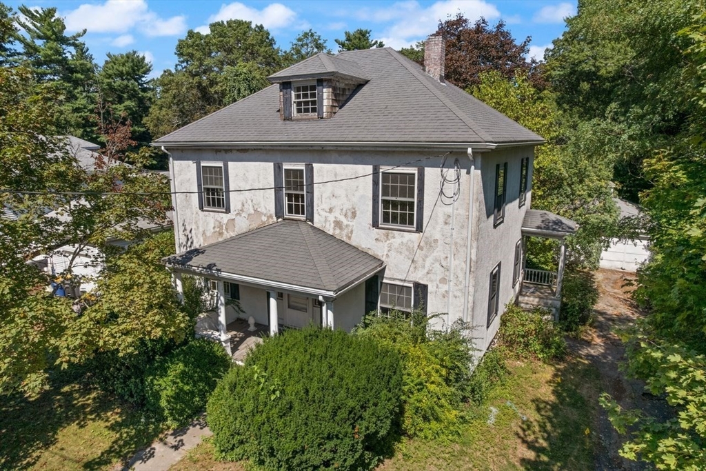 17 Pine Road Sharon, MA 02067 - Photo 30 of 33 a aerial view of a house next to a yard