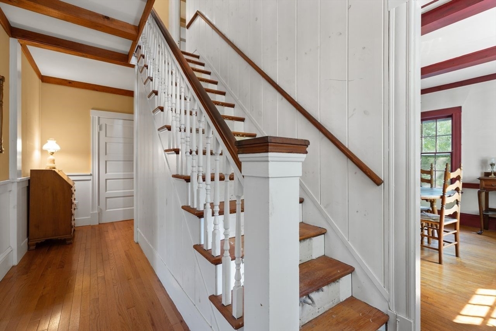 17 Pine Road Sharon, MA 02067 - Photo 4 of 33 a view of entryway with wooden floor and stairs