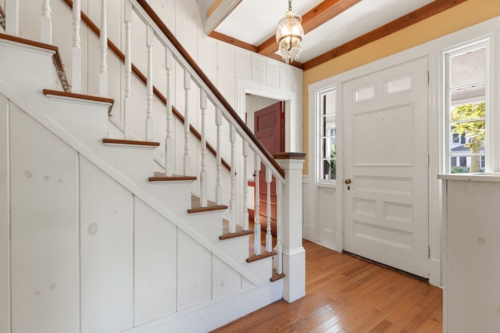 17 Pine Road Sharon, MA 02067 - Photo 6 of 33 a view of entryway with wooden floor and stairs